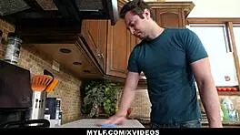 Milf rewarding young guy with hard fuck in kitchen