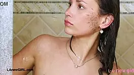 Runway-Ready Brunette Enjoys Relaxing Shower Session