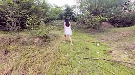 Thai babe masturbates in forest