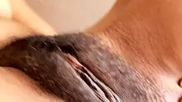 Making my hairy pussy wet and creamy