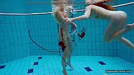 Two hot lesbians in the pool