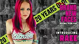 Introducing Raee, the 20-year-old goth redhead slut pornstar, showcasing her small tits and big ass in a behind-the-scenes casting interview.