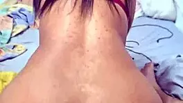 enjoy the view of this big-assed girl opening her ass while taking a cock in her anus