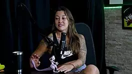 safada performs sensual stripper show revealing breasts after denying transsexual suggestion and recalling virginity loss