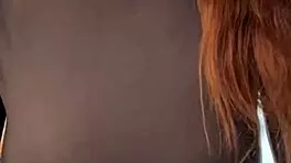 woman caresses her milky tits until she orgasms