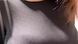 woman caresses her milky tits until she orgasms