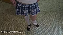 Student Interacts with Teacher in Institutional Bathroom