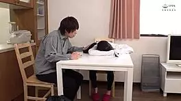 young japanese couple shares intimate moments in the bedroom