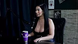 Amy Yamaguchi in sheer red lingerie engages in hotwife swing with sixteen men in group sex.