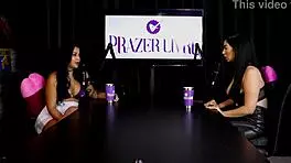 Amy Yamaguchi in sheer red lingerie engages in hotwife swing with sixteen men in group sex.