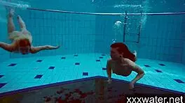 milana and katrin strip eachother underwater