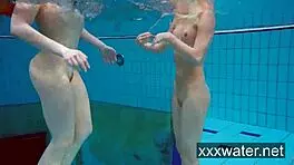 milana and katrin strip eachother underwater