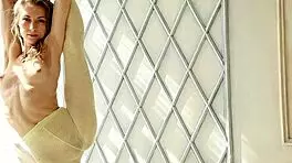 Adorable ballerina gets naked on couch