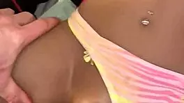 Pornstar shows her hairy pussy in lingerie, small tits on display.