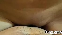 Beautiful teen college girl with big tits swallows complete liquid on red camera