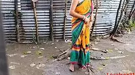 raini enjoys outdoor sex with her bengali boudi friend in the country ranch during a webcam session