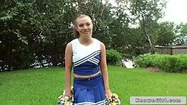 Busty cheerleader flashes tits outdoors!