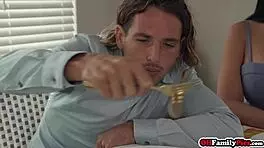 Blonde bisexual teens Jessie Saint and Katie Kush sharing an intimate moment together in a group setting.