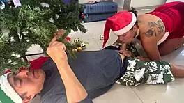 Busty young woman gives new year gift to old man.