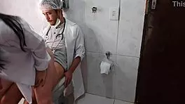 Nurse interacts with doctor in hospital bathroom
