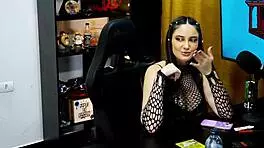 Victoria Camargo Bent Over on Podcast Table