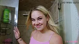blonde fashion model enjoys shower after photoshoot