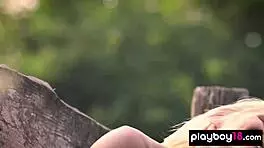 Hungarian Blondie Mikki Galante Reveals Her Fresh Shaved Pussy on a Floral Meadow During Outdoor Striptease