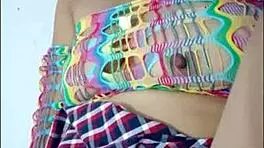 opening her pussy and inserting a pink dildo she shows her wet pussy