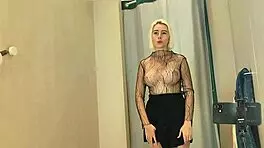 Horny young blonde in fitting room shows big tits and puffy nipples, craving intense fuck.