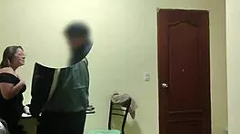 Young latina employee flirts seductively in bedroom