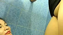 two girls peeing together in hot threesome