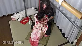 rope bunny gets teased with vibrator on clit and pussy clamps