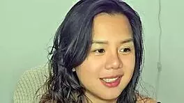 asian teen amateur gets excited by homemade music track