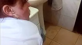 Redhead helps friend masturbating in shower