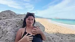 on this public beach, that horny curvy woman is so tempting