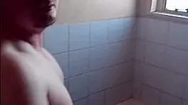 in the bathroom, she gives a passionate blowjob
