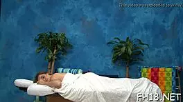 Oiled naked babe gets rough wet pussy massage and suck