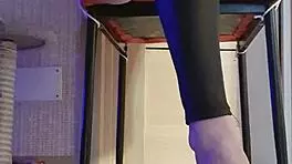 Woman in Black Leggings Teases with Subtle Fingering