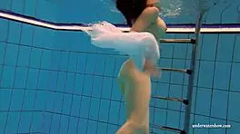 kristy big boob babe splashing in pool underwater