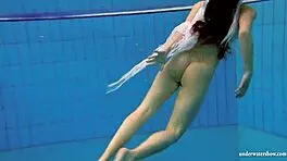 kristy big boob babe splashing in pool underwater