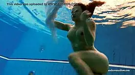 kristy big boob babe splashing in pool underwater