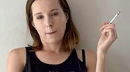 Petite Brunette Teases Smoking with Blue Eyes Voyeur