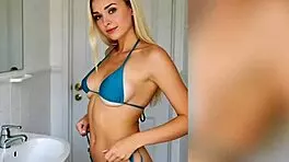 check out this 40 year old blonde bouncing her cute ass in the bathroom dance