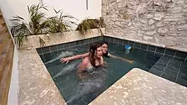 Two horny Colombians finger wet pussies publicly at pool risking exposure