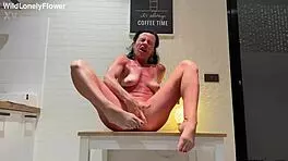 Kitchen Table Turns Passionate for Tanned Housewife