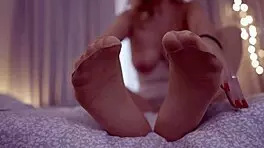 sexy blonde teases feet in nylons craving your hot load