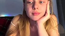 Blonde teen teases wet pussy with fingers to orgasm