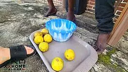 Outdoor romp with orange vendor girl