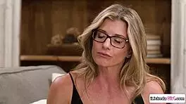 lesbian babe swaps spit then licks big tits milf's pussy