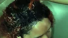 couple shares tender intimate moments in steamy hotel bath